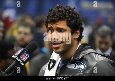 NEWARK, NJ - Januar 28: Russell Wilson spricht zu den Medien während des Super Bowl XLVIII Medien Tag im Prudential Center am 28 Januar, 2014 in Newark, New Jersey. Super Bowl XLVIII wird zwischen die Seattle Seahawks und die Denver Broncos am 2. Februar. in Newark New Jersey Personen: Russell Wilson gespielt werden Stockfoto