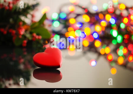 Festliche Weihnachten Hintergrund. Elegante abstrakt Hintergrund mit Bokeh defokussierten Lichter und Sterne und Herzen Stockfoto