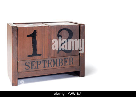 Holz- Perpetual Calendar 12. bis September Stockfoto