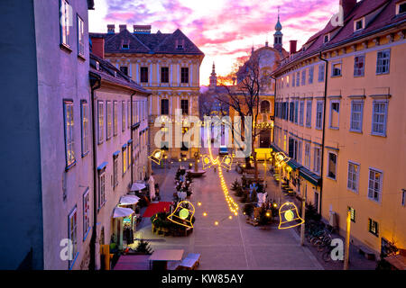 Grazer Innenstadt Weihnachtsmarkt Blick auf den Sonnenuntergang, Steiermark in Österreich Stockfoto