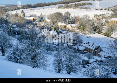 Naunton Dorf im Schnee im Dezember. Naunton, Cotswolds, Gloucestershire, England Stockfoto