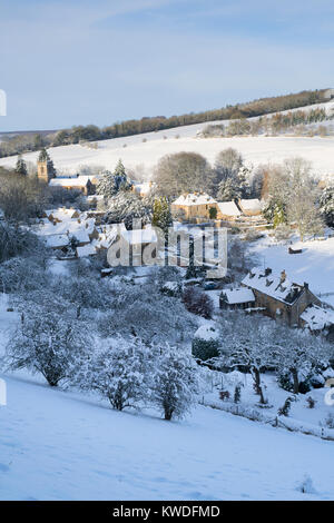 Naunton Dorf im Schnee im Dezember. Naunton, Cotswolds, Gloucestershire, England Stockfoto