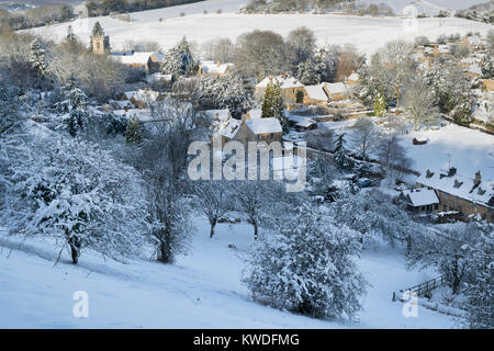 Naunton Dorf im Schnee im Dezember. Naunton, Cotswolds, Gloucestershire, England Stockfoto