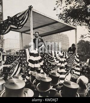Theodore Roosevelt im Schlitten mit Bürgermeister Gaynor und Alfred Gwynne Vanderbilt, 18. Juni 1910. Die lange Parade enthalten 13 Kutschen der VIPs, 3 Marching Bands, spanisch-amerikanischen Kriegsveteranen und berittene Polizei (BSLOC 2017 8 24) Stockfoto