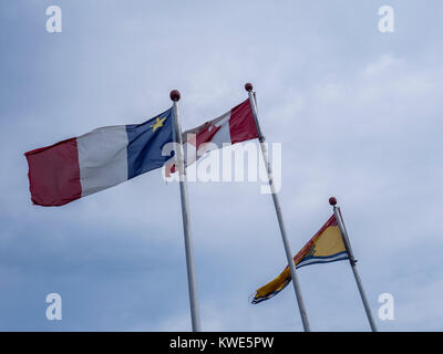 Acadian, Kanadischen und New Brunswick provinziellen Fahnen, Pointe-Sapin, New Brunswick, Kanada. Stockfoto