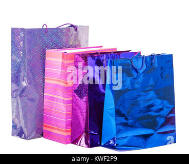 Haufen Sie bunte Papiertüten für Geschenke, isoliert auf weiss Stockfoto