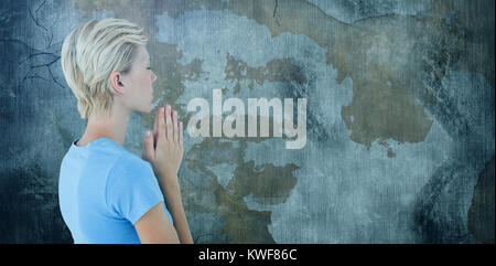 Composite-Bild von ziemlich blonde Frau beten Stockfoto