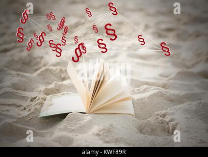 3D Section Symbol Symbole und Buch in Sand Stockfoto