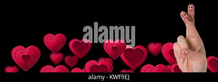 Valentine's Finger Liebe Paar und schwebende Herzen Stockfoto