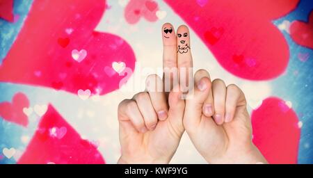 Valentine's Finger lieben Paar und magische schwebende Herzen Stockfoto