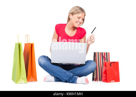 Frau shopping online mit Kreditkarte Stockfoto