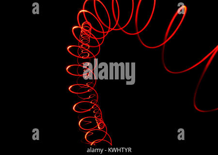 Lightart auf schwarzem Hintergrund - Lightpainting Stockfoto