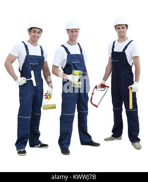 Gruppe von Bauherren in Overalls auf weißem Hintergrund Stockfoto