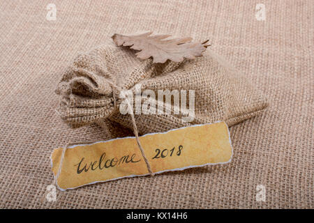 2018 Formulierung auf ein zerrissenes Papier Willkommen Stockfoto