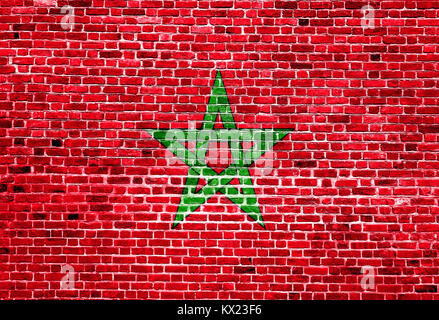 Flag of Morocco painted on brick wall, background texture Stockfoto