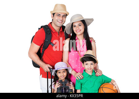 Glückliche Familie, Eltern und Kinder mit Koffer bereit zu Vacation-Holiday Stockfoto