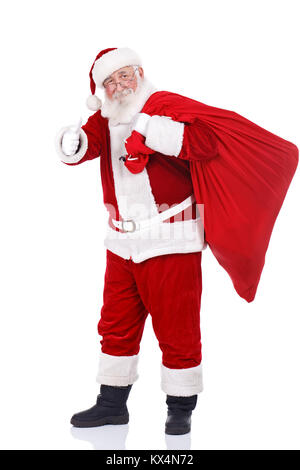 Real Santa Claus, Big Bag und mit Ok, auf weißem Hintergrund Stockfoto