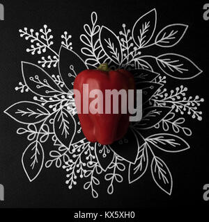 Red Paprika über Outline floral hand Hintergrund Stockfoto