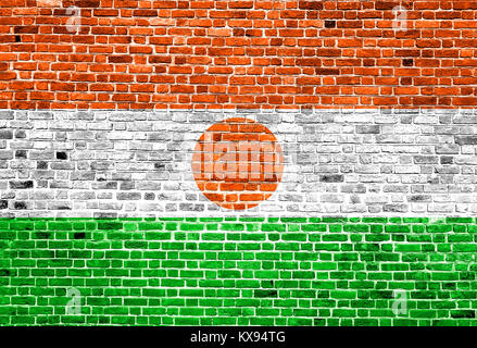 Flagge Niger auf die Wand gemalt, Hintergrund Textur Stockfoto