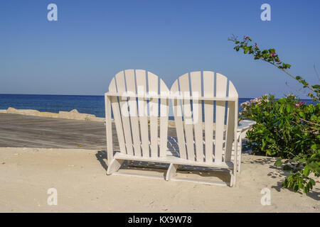 Liebhaber Sitz am Strand in Jamaika Karibik Stockfoto