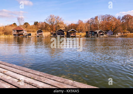 Alten hölzernen Boot Häuser am Starnberger See in Bayern, Deutschland Stockfoto