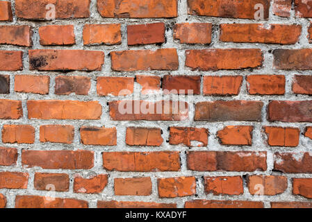 Ein Teil der Wand aus rotem Backstein verstärkte Zement Stockfoto