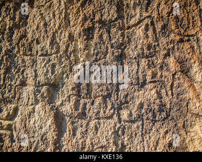 Echten Felswand mit petroglyphs Hintergrund (in der gobustan Nationalpark, Aserbaidschan) Stockfoto