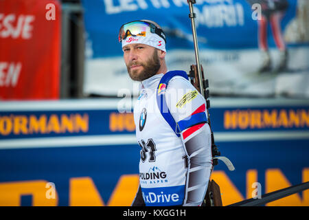 Ruhpolding, Deutschland. 10 Jan, 2018. Daniel Mesotitsch (101, Österreich) überquerte die Ziellinie bei den Herren 20 km einzelnen Konkurrenz an der BMW IBU Weltcup Biathlon in Ruhpolding. (Foto: Gonzales Foto/Alamy leben Nachrichten Stockfoto