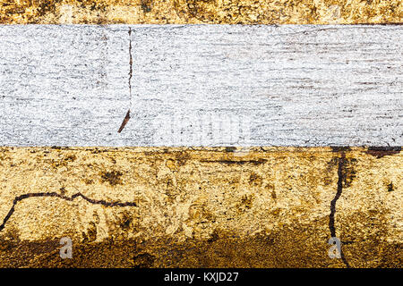 Silber mit goldenen holprigen Wand stuck Textur Hintergrund Stockfoto