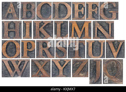 Vollständige englische Alphabet in vintage Holz Art - eine Collage aus 26 isolierte Buchdruck Blöcke mit einer digitale Malerei Effekt (Holzkohle) Stockfoto