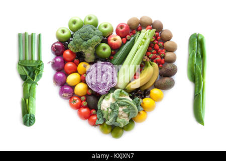 Gabel und Messer aus Gemüse mit Herzform Obst und Gemüse als Mahlzeit Stockfoto