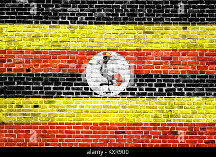 Flagge Uganda auf Stein Wand gemalt Stockfoto