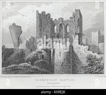 Caerphilly Castle in Glamorganshire, Wales, ist eine mittelalterliche Festung mit umfangreichen Verteidigungsstrukturen, die für die walisische Geschichte und die mittelalterliche Militärstrategie von Bedeutung sind. Stockfoto