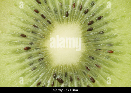 In Scheiben geschnittene grüne Kiwi Textur Hintergrund Stockfoto