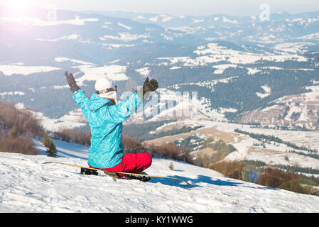 Junge Frau mit snowboard Stockfoto