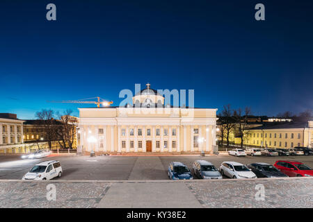 Helsinki, Finnland - 9. Dezember 2016: Die nationale Bibliothek von Finnland In der Beleuchtung am Abend oder in der Nacht die Beleuchtung. Administrativ ist die Bibliothek Pa Stockfoto