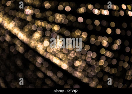 Hintergrund des unscharfen LED-Leuchten im Dunkeln. Festival Konzept, Muster Stockfoto