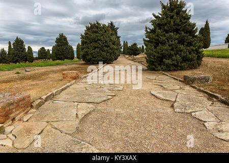 Römische Straße in den Ruinen von Italica. In Santiponce in der Nähe von Sevilla entfernt. Spanien. Stockfoto