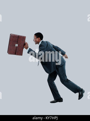 African American Business Mann laufen. Stockfoto