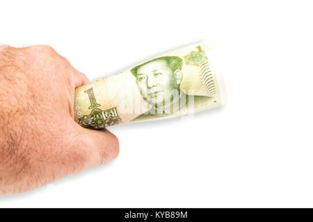 Weiß rauh hält eine yuan Banknote in seiner linken Hand auf weißem Hintergrund Stockfoto