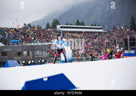 Ruhpolding, Deutschland. 14 Jan, 2018. Julian Eberhard von Österreich (18) Während der Männer 15 km Massenstart am BMW IBU Weltcup Biathlon in Ruhpolding gesehen. (Foto: Gonzales Foto/Alamy leben Nachrichten Stockfoto