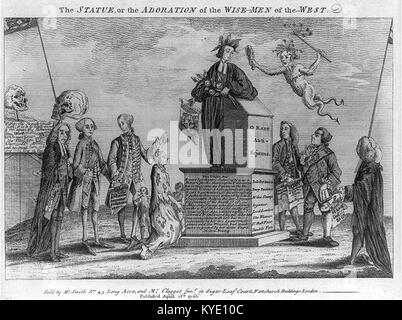 Eine Statue, die die biblische Anbetung der Könige darstellt, zeigt die drei Weisen, die dem Jesuskind Geschenke überreichen, ein wichtiges Thema in der christlichen religiösen Kunst und Geburtsdarstellung. Stockfoto