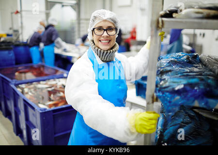 Arbeiten bei Meeresfrüchten Anlage Stockfoto