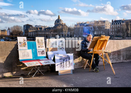 PARIS - Jan 2, 2014: Ein unbekannter Maler bei der Arbeit mit seiner Staffelei und eine Anzeige der seine Arbeit für den Verkauf auf Pont Neuf, die älteste Brücke über die Seine. Uhr Stockfoto