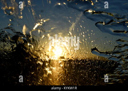 Flüssige Sonnenuntergang während der Fahrt West Stockfoto