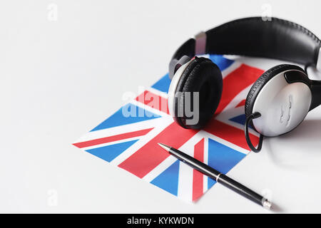 Das Erlernen von Fremdsprachen. Notepad für Einträge und eine Fahne. Lang Stockfoto