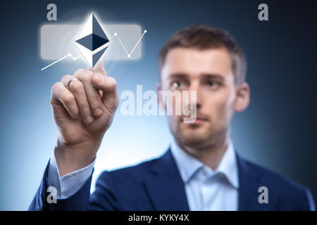 Hand berühren die Welligkeit auf das Symbol auf dem Bildschirm Stockfoto