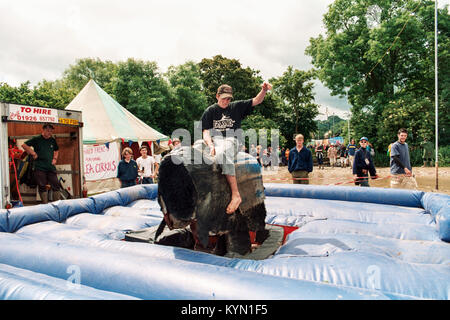 Ruckeln bronco Reiten auf dem Glastonbury Festival 1998, Somerset, England, Vereinigtes Königreich. Stockfoto