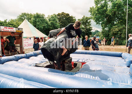 Ruckeln bronco Reiten auf dem Glastonbury Festival 1998, Somerset, England, Vereinigtes Königreich. Stockfoto