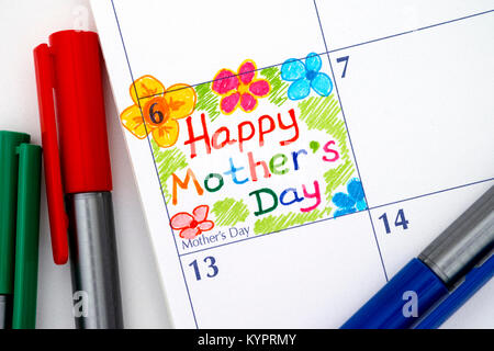 Erinnerung Happy Mother's Day im Kalender mit Stiften. Close-up. Stockfoto